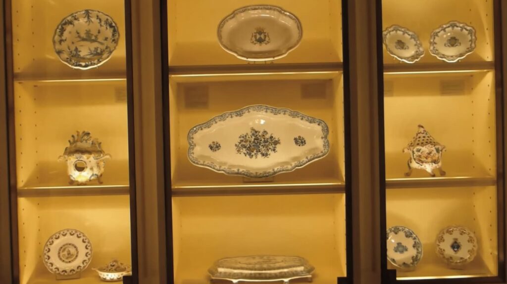 An exhibit of antique, ornately patterned porcelain dishes